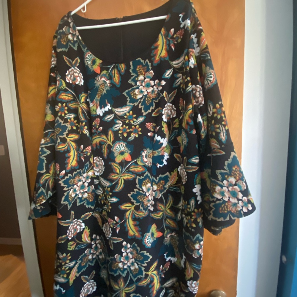 Colorful dress with bell sleeve.